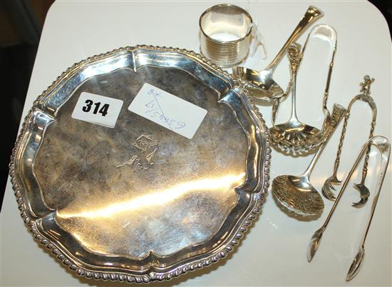 Edwardian silver salver, napkin ring, two pairs of plated sugar tongs and three plated sugar sifter spoons